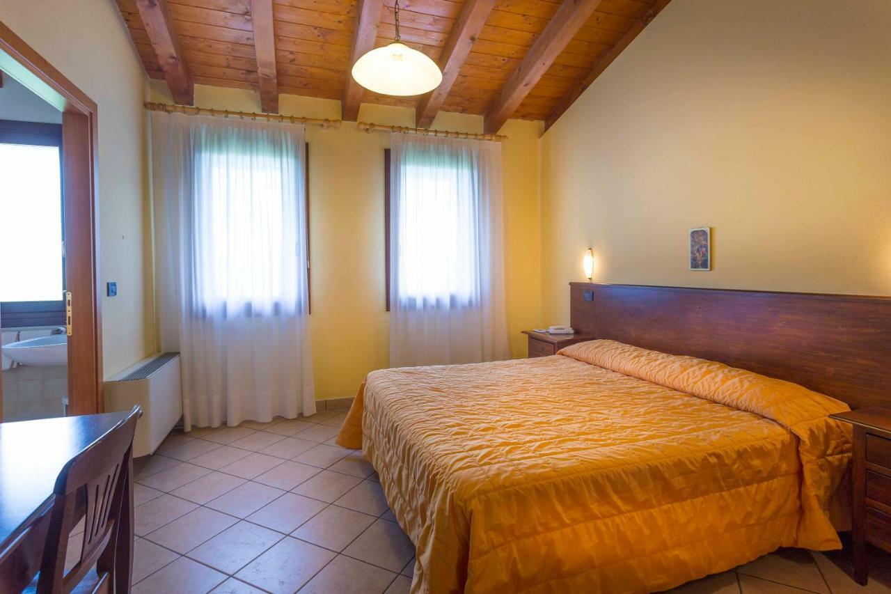 Agriturismo Tenuta Regina - Glamping luxury lodges Palazzolo dello Stella Bagian luar foto